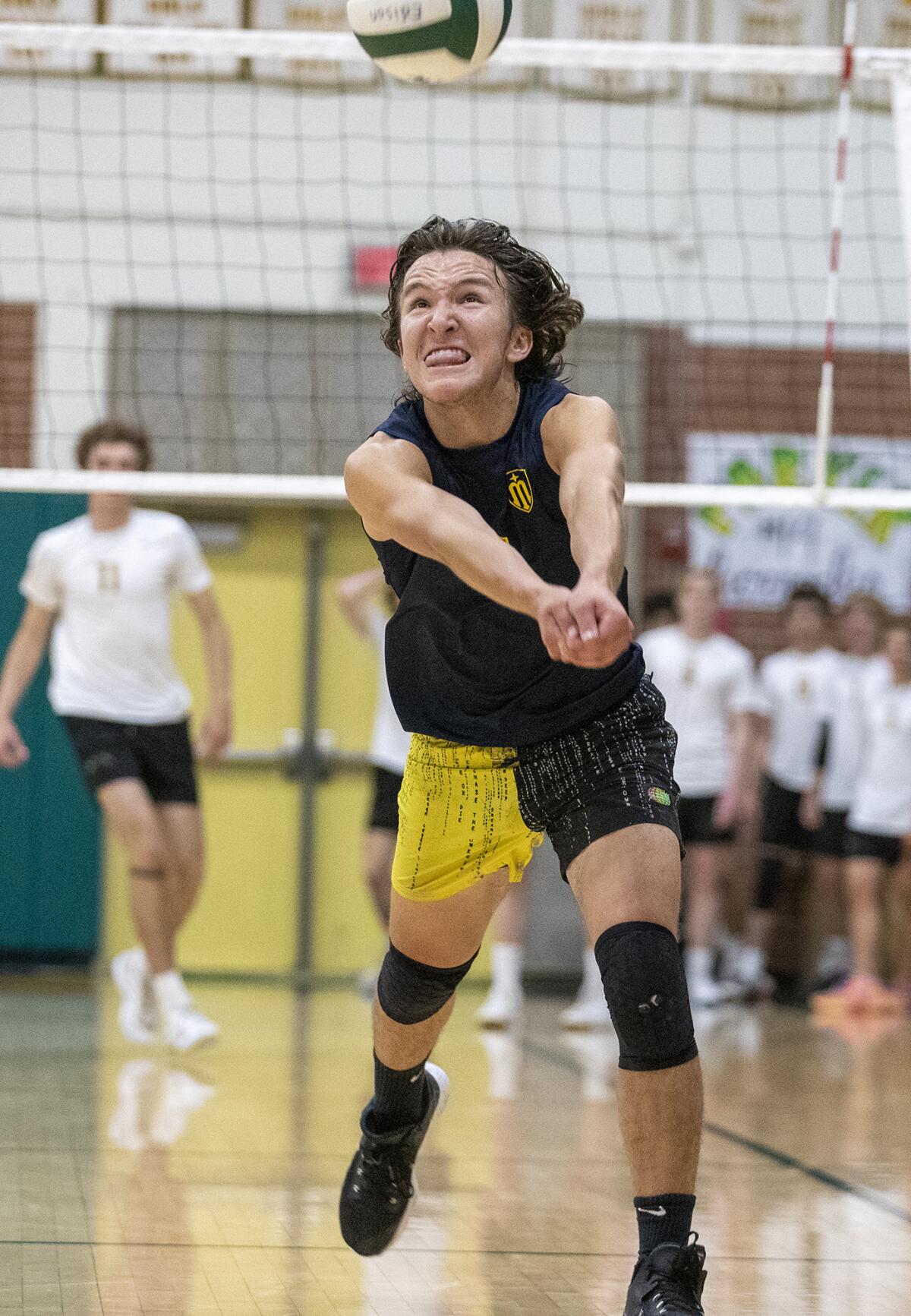 Marina's Joseph Nunez hustles for a ball during a Wave League match against Edison on Thursday.