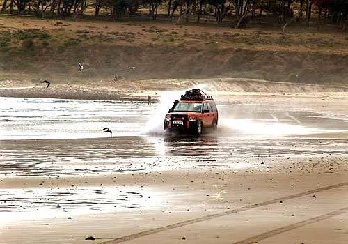 The Land Rover LR3 pushes on through the slack tide on a Chilean beach near Pichidangui, just north of Valparaiso.