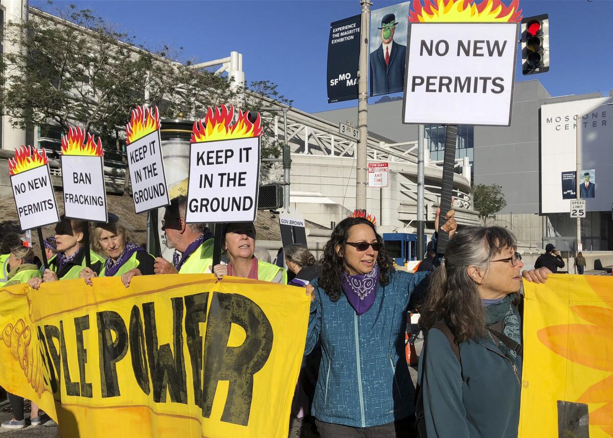 Members of the group 1000 Grandmothers protest in San Francisco, where the Global Climate Action Summit is being held.