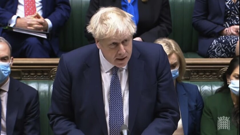 In this grab taken from video, Britain's Prime Minister Boris Johnson makes a statement ahead of Prime Minister's Questions in the House of Commons, London, Wednesday, Jan. 12, 2022. Johnson has apologized for attending a garden party during Britain’s coronavirus lockdown. He said Wednesday that there are things the government “did not get right.” Johnson is facing anger from public and politicians over claims he and his staff flouted pandemic restrictions by socializing when it was banned. Some members of his Conservative Party say he should resign if he can’t quell the furor. (House of Commons/PA via AP)