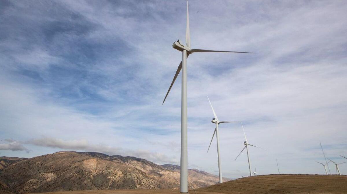 Wind turbines near State Route 58 generate electricity for new energy provider Clean Power Alliance.