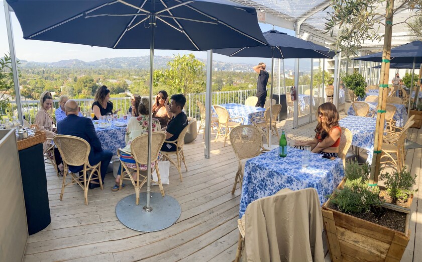 A photo of the patio at Sant'olina at the Beverly Hilton.