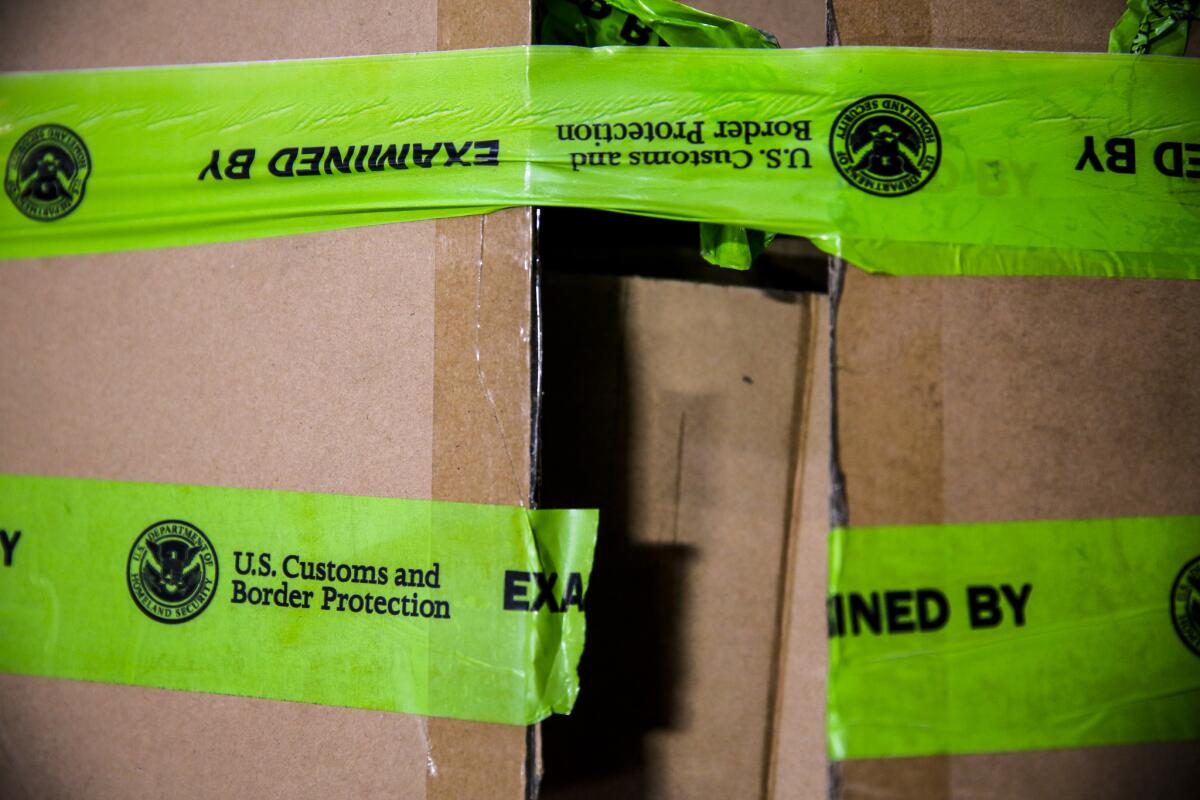 Boxes inspected by U.S. Customs and Border Protection officers are shown at a station in the Los Angeles area.