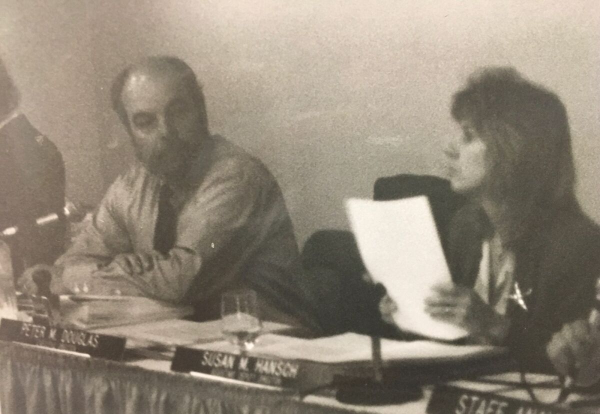 Peter Douglas, left, and Susan Hansch, right, at a California Coastal Commission meeting in the 1990s.
