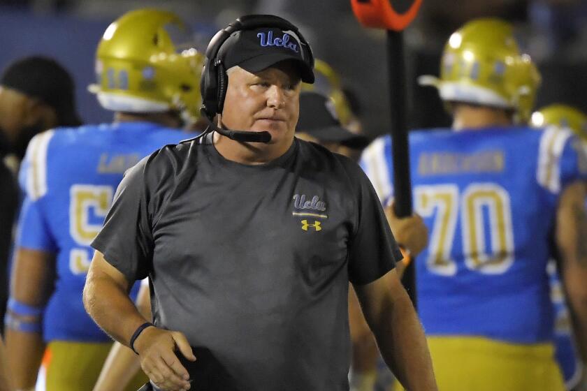 FILE - In this Sept. 14, 2019 file photo, UCLA coach Chip Kelly stands on the sideline.