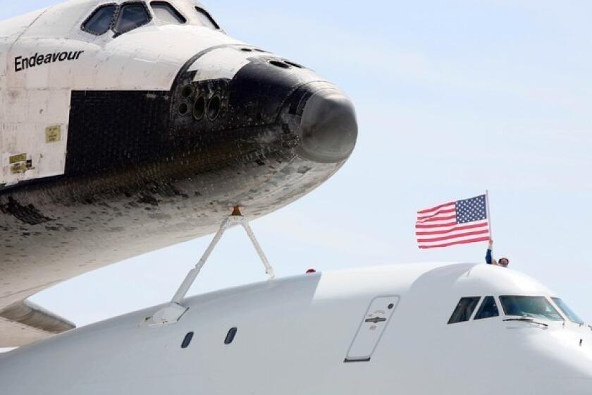 The space shuttle Endeavour arrives on board a modified 747 at LAX en route to being put on display at the California Science Center.