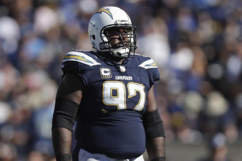 Los Angeles Chargers defensive tackle Brandon Mebane stands on the field during an NFL football game against the Los Angeles Rams Sunday, Sept. 23, 2018, in Los Angeles. (AP Photo/Jae C. Hong)