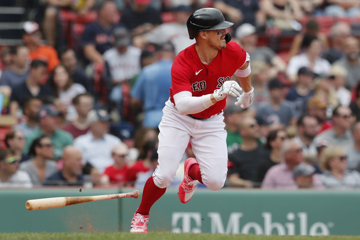 Boston Red Sox's Enrique Hernandez runs on his two-run double during the second inning of the first game of a baseball doubleheader against the Baltimore Orioles, Saturday, May 28, 2022, in Boston. (AP Photo/Michael Dwyer)