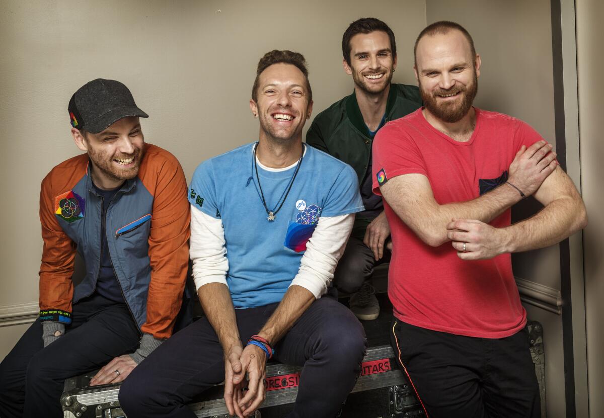 Coldplay (from left, Jonny Buckland, Chris Martin, Guy Berryman and Will Champion) will perform in seven stadiums across the U.S. this summer as part of the band's first world tour in five years.