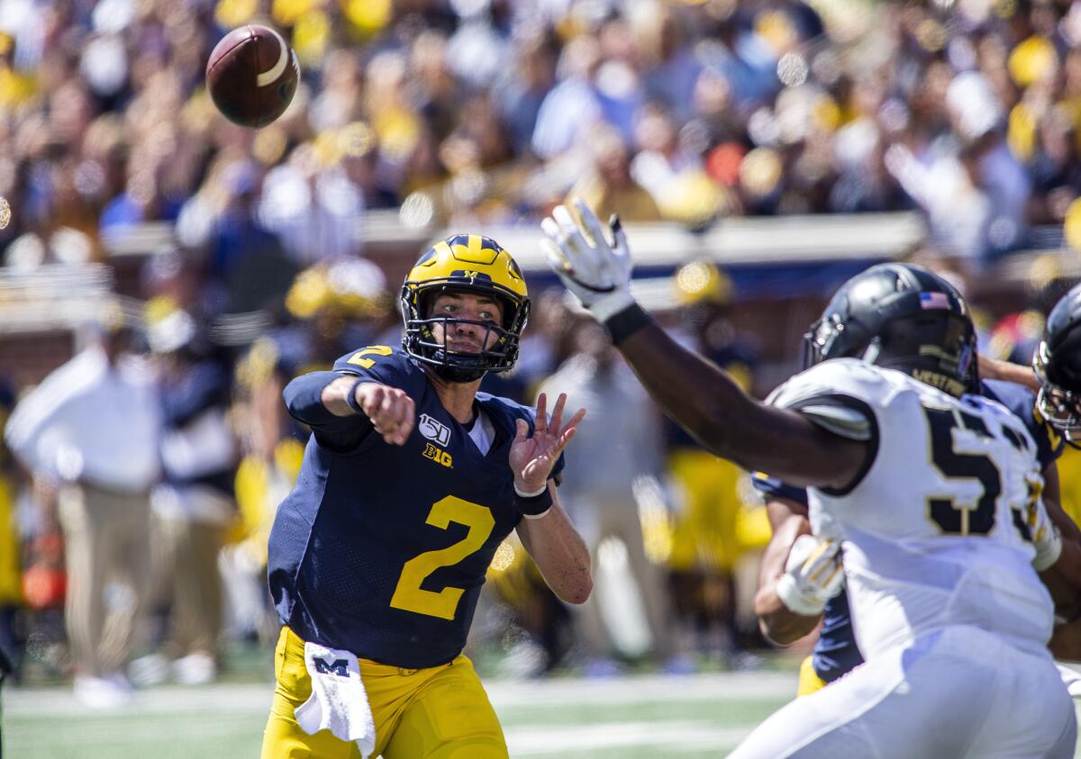 Michigan quarterback Shea Patterson delivers a pass against Army during the second quarter Saturday.