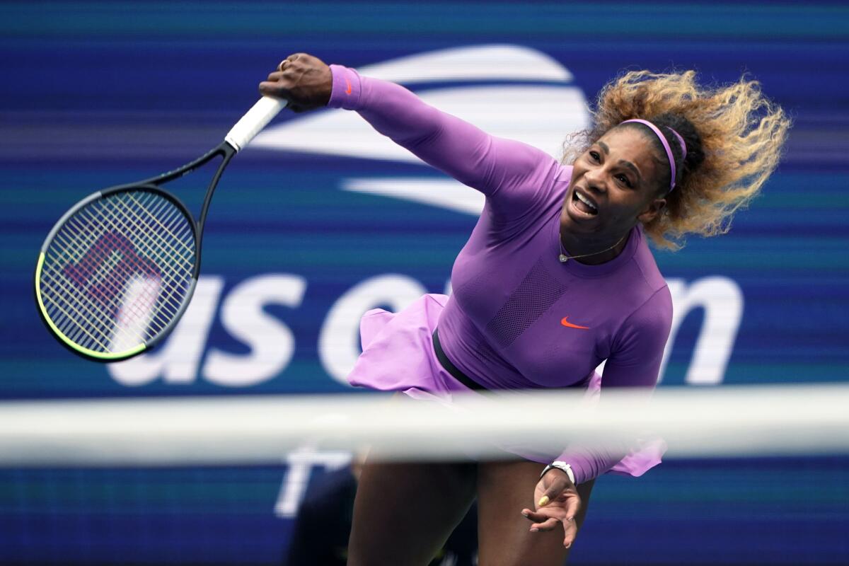 Serena Williams returns a shot to Bianca Andreescu, of Canada, during the 2019 U.S. Open 