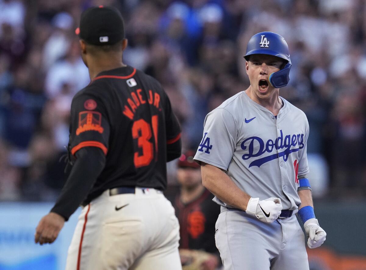 Dodgers catcher Will Smith, right, celebrates during a game against the San Francisco Giants at Oracle Park.