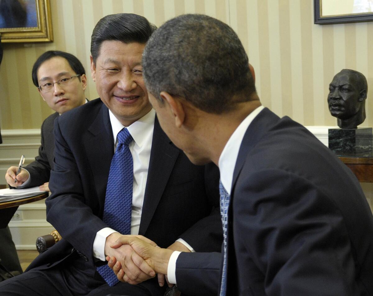 President Obama and Chinese President Xi Jinping will meet at week's end for an unusual two-day summit at a Southern California estate. Above: Obama and Jinping last met in 2012.