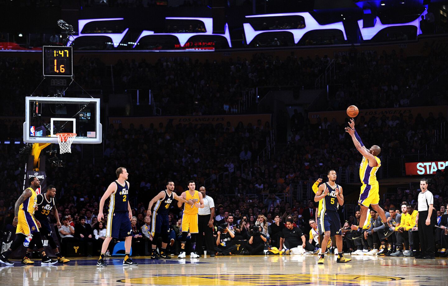 Kobe Bryant takes a shot in the first quarter of his final game at the Staples Center Wednesday.