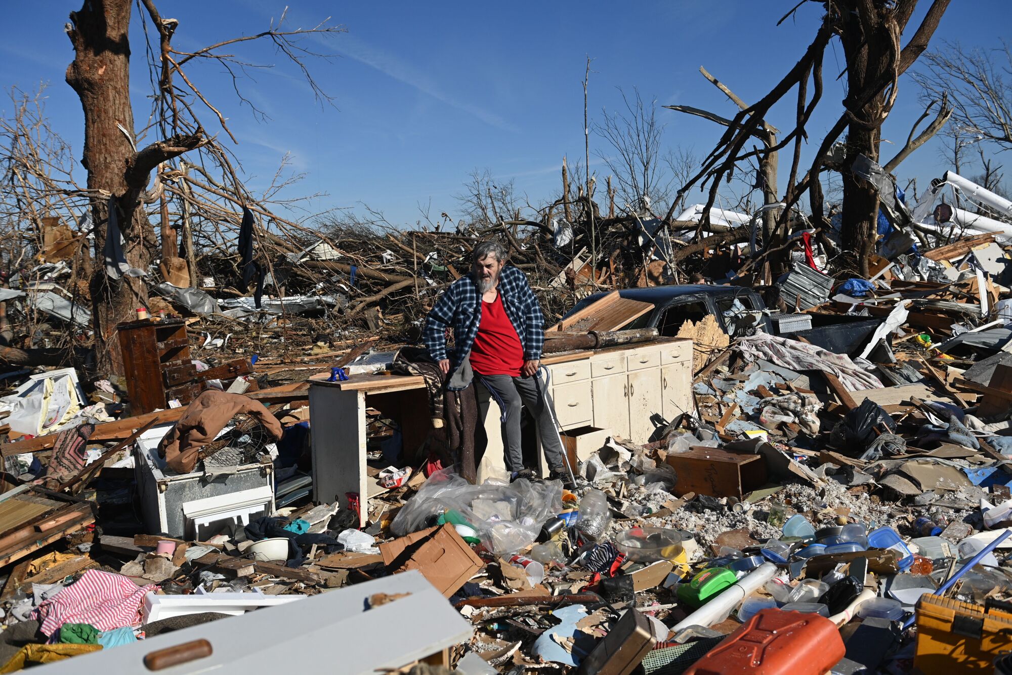 Bogdan Gaicki surveys tornado damage in Mayfield, Ky.