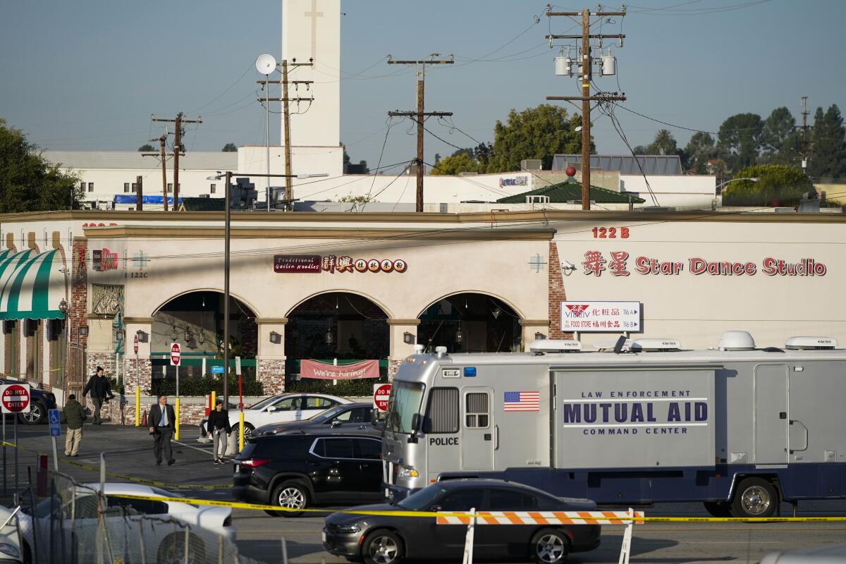 A law enforcement truck is scene in a parking lot with crime scene tape