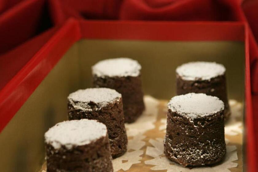 Thomas Keller's chocolate bouchons have a texture somewhere between dense cake and denser brownies. Recipe: Chocolate bouchons