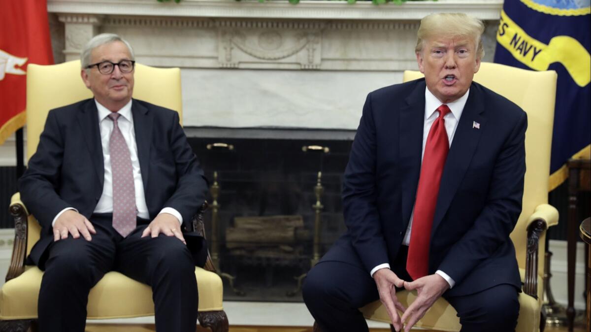 European Commission President Jean-Claude Juncker, left, meets with President Trump in the Oval Office on Wednesday.