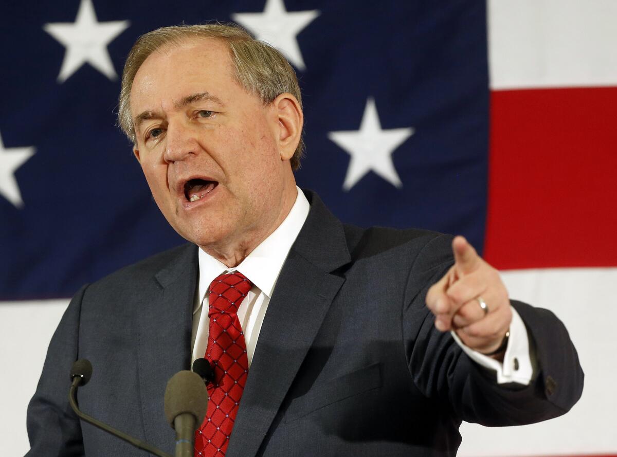 FILE - In this April 17, 2015, file photo, former Virginia Gov. Jim Gilmore speaks at a Republican Leadership Summit in Nashua, N.H. The Republican presidential contest has grown to 17 candidates with the July 29 entry of Jim Gilmore as he files the necessary paperwork with the Federal Election Commission.. (AP Photo/Jim Cole, File)