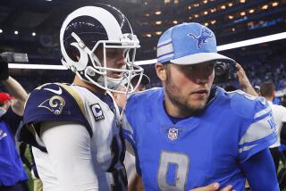 The Rams' Jared Goff and the Detroit Lions' Matthew Stafford after a game in 2018.