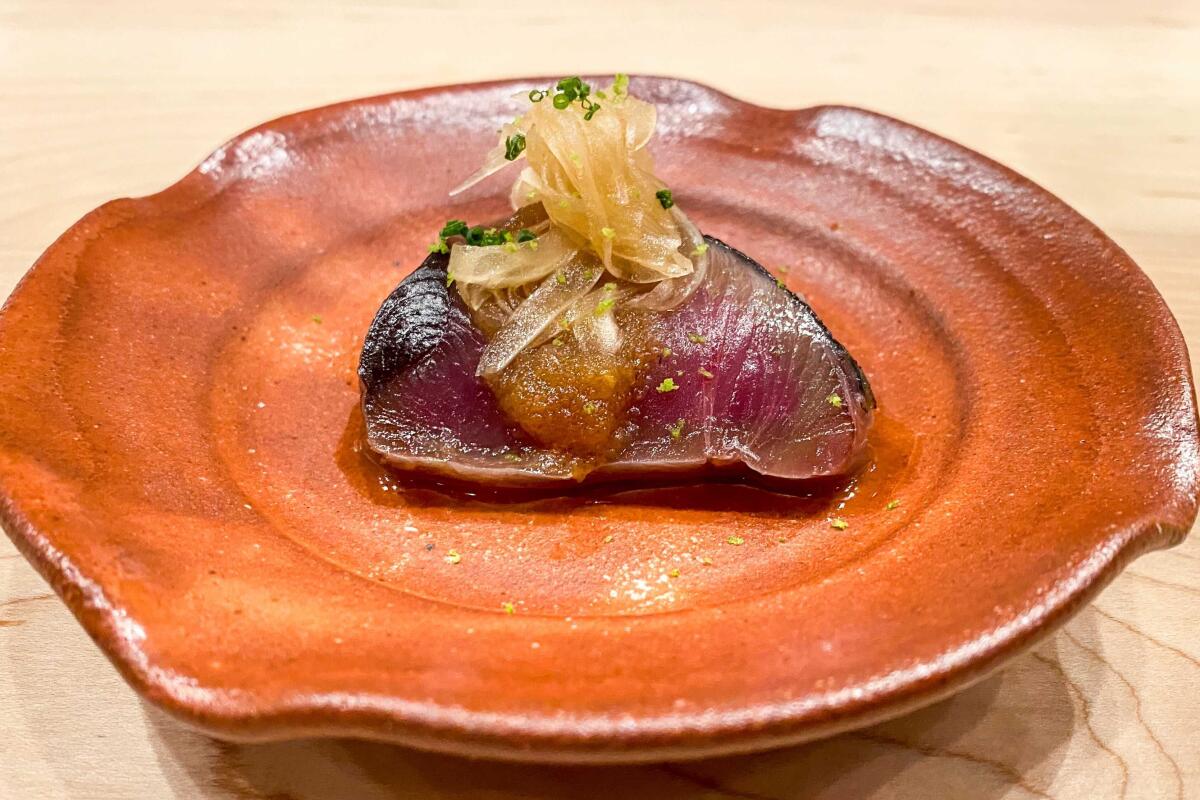 Cherry wood-smoked hatsu katsuo, skipjack tuna, with pickled onions