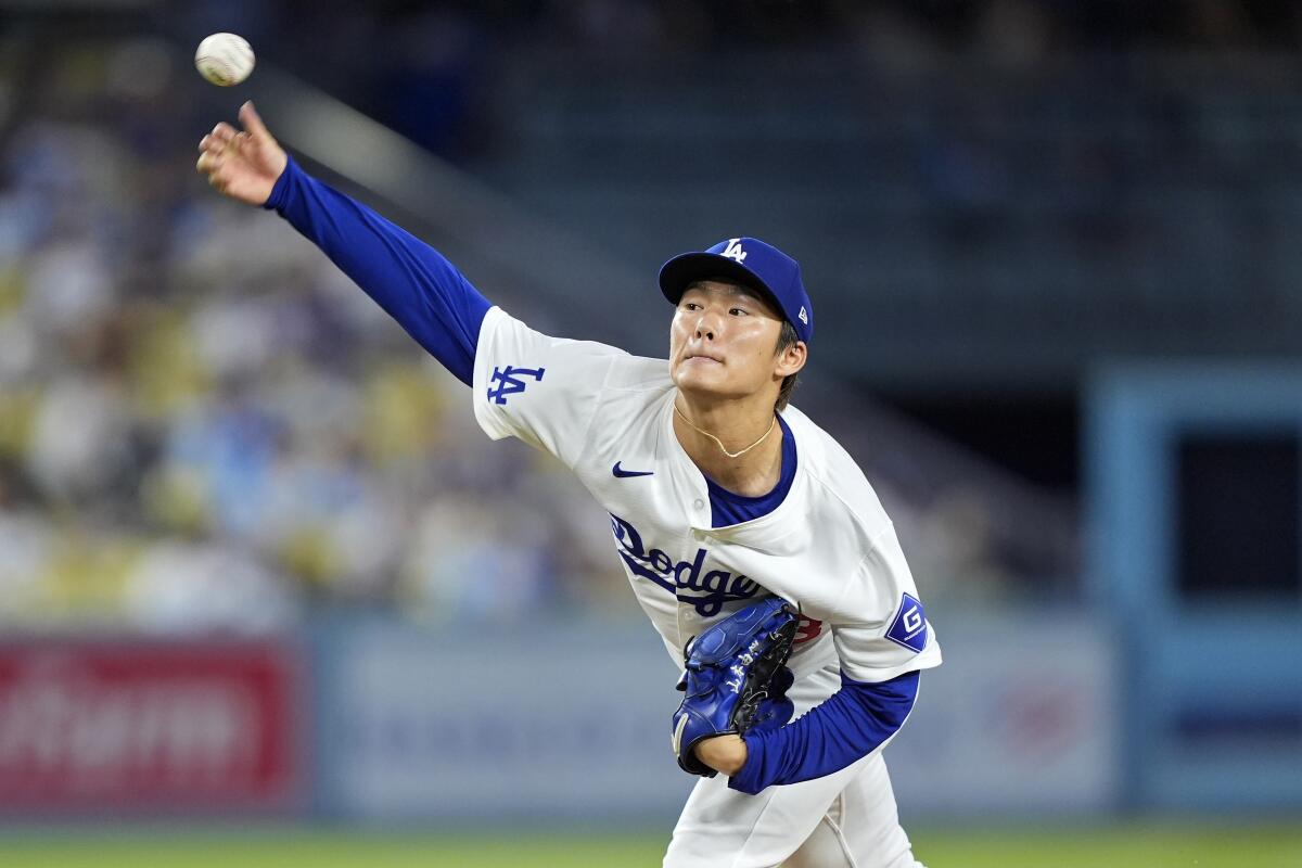 Yoshinobu Yamamoto pitches in the first inning Tuesday.