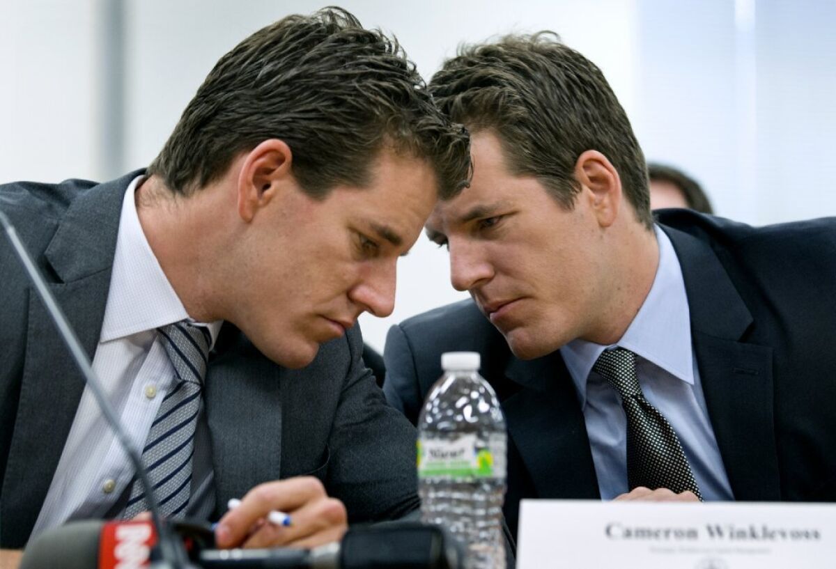 The Winkelvoss twins of Facebook litigation fame, who have applied to start a bitcoin investment fund, at a regulatory hearing last month in New York.
