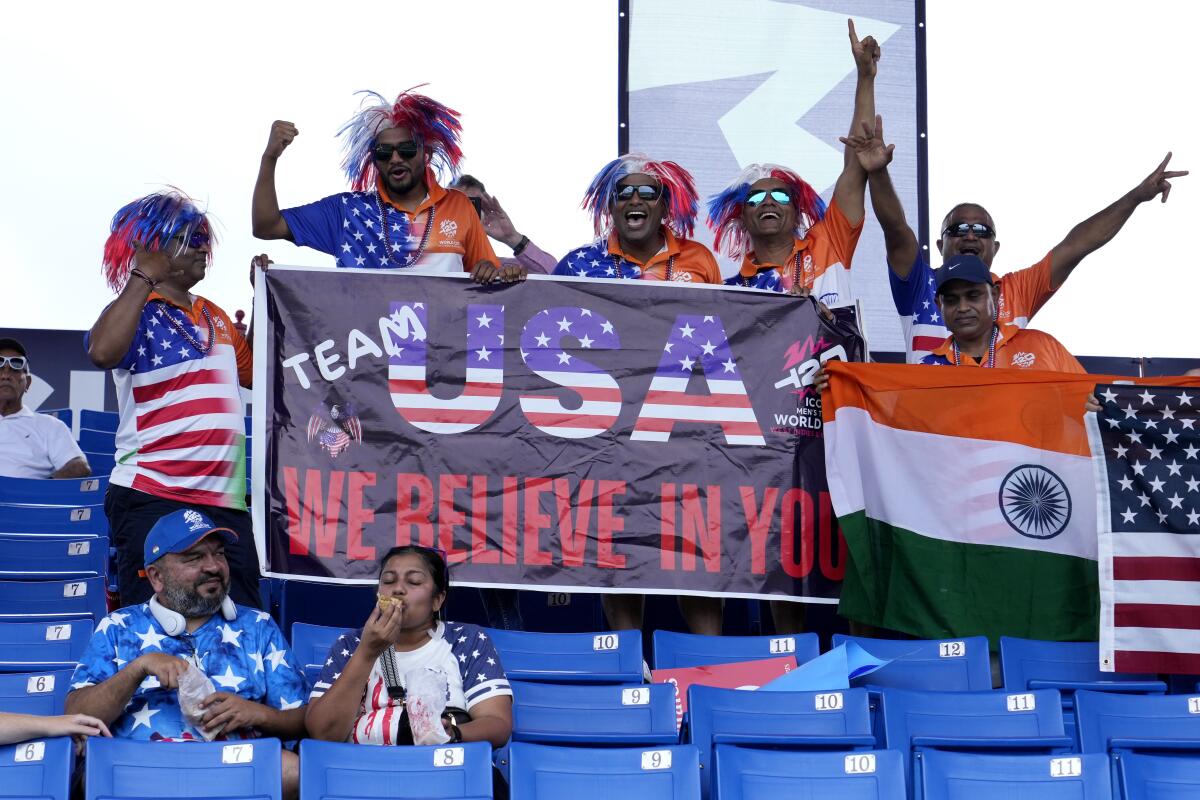 U.S. cricket fans cheer before the Americans were scheduled to play Ireland during the T20 World Cup