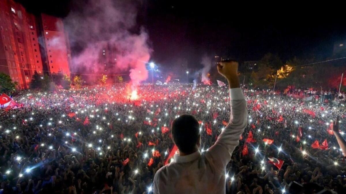 Ekrem Imamoglu, the winning mayoral candidate of the secular opposition Republican People's Party, or CHP, waves to supporters at a rally in Istanbul, Turkey's largest city, on June 23, 2019.