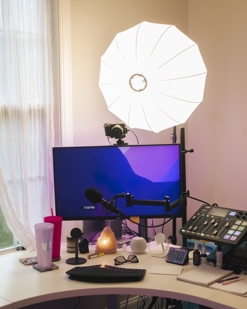 A home office setup with lighting.