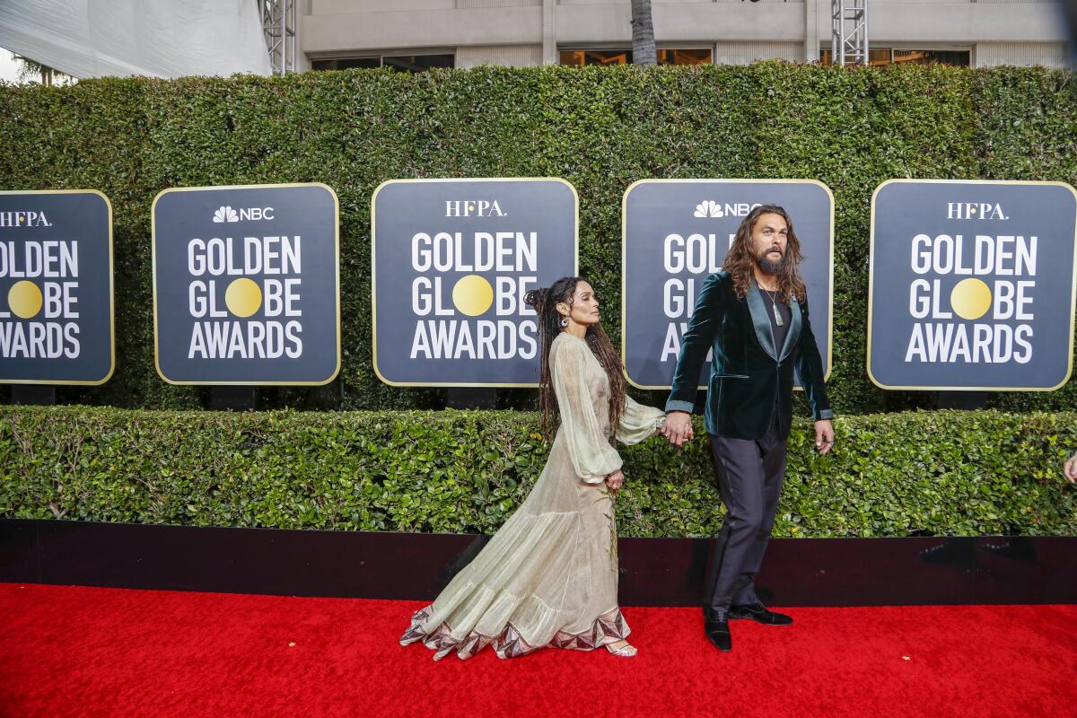 Hit: Jason Momoa in a green velvet Tom Ford suit and black Valentino trousers.