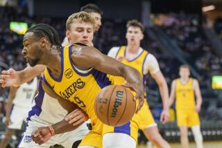 Los Angeles Lakers guard Bronny James (9) drives toward the basket during the second half.