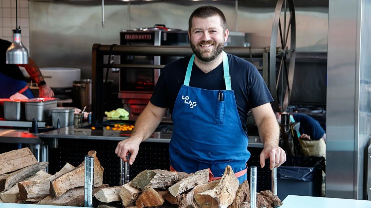 Lola 55 executive chef Andrew Bent, who has serious restaurant cred, uses a wood-fire grill to develop flavor. On Tuesday, he was also hand-making tortillas.