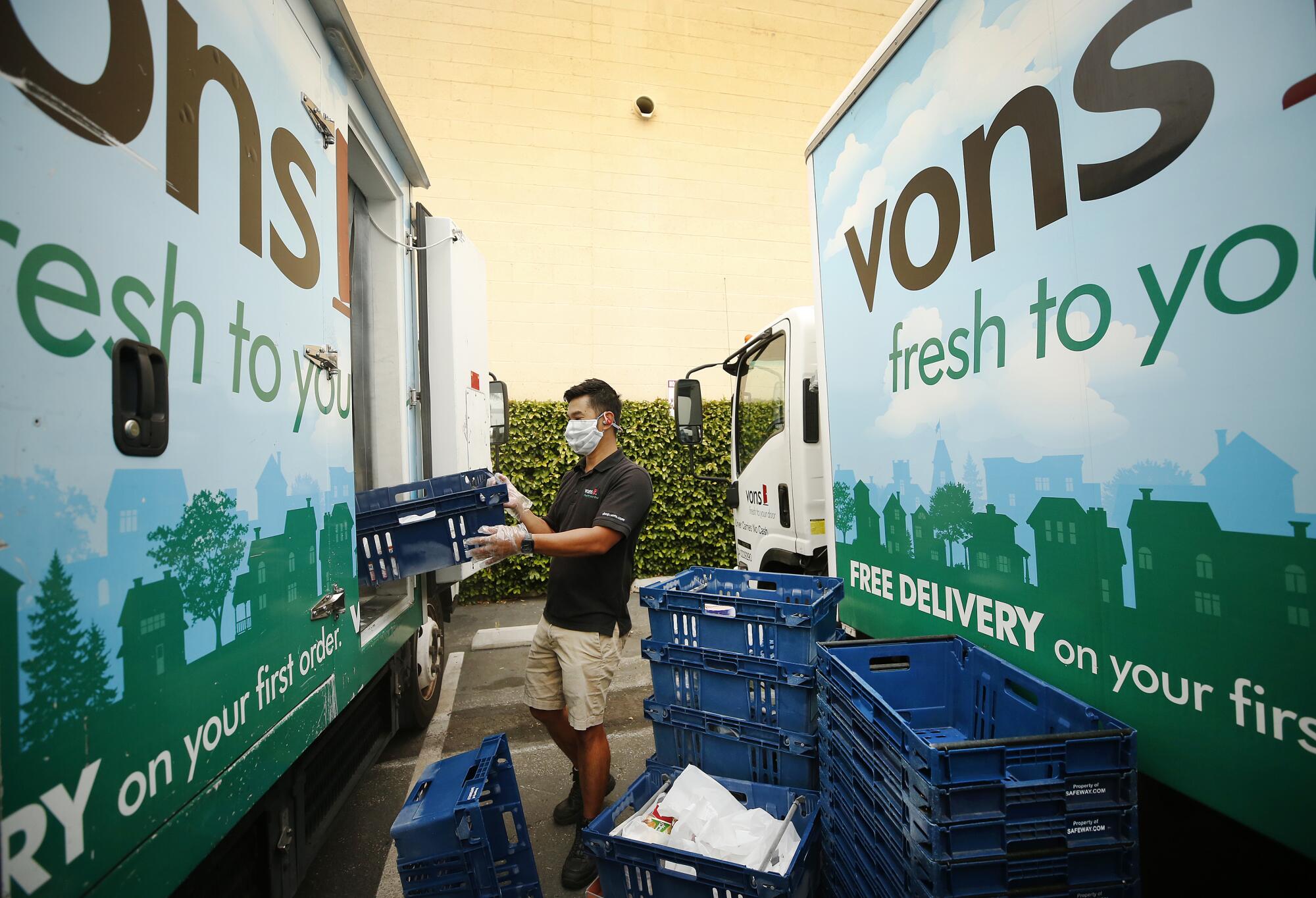 Delivery driver James Hang prepares his orders.
