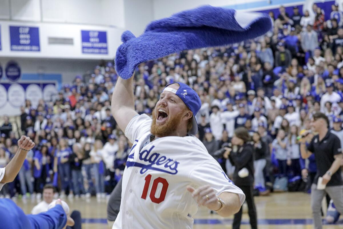 Dodgers third baseman Justin Turner participates in a game during a pep rally at Saugus High School in Santa Clarita on Friday.