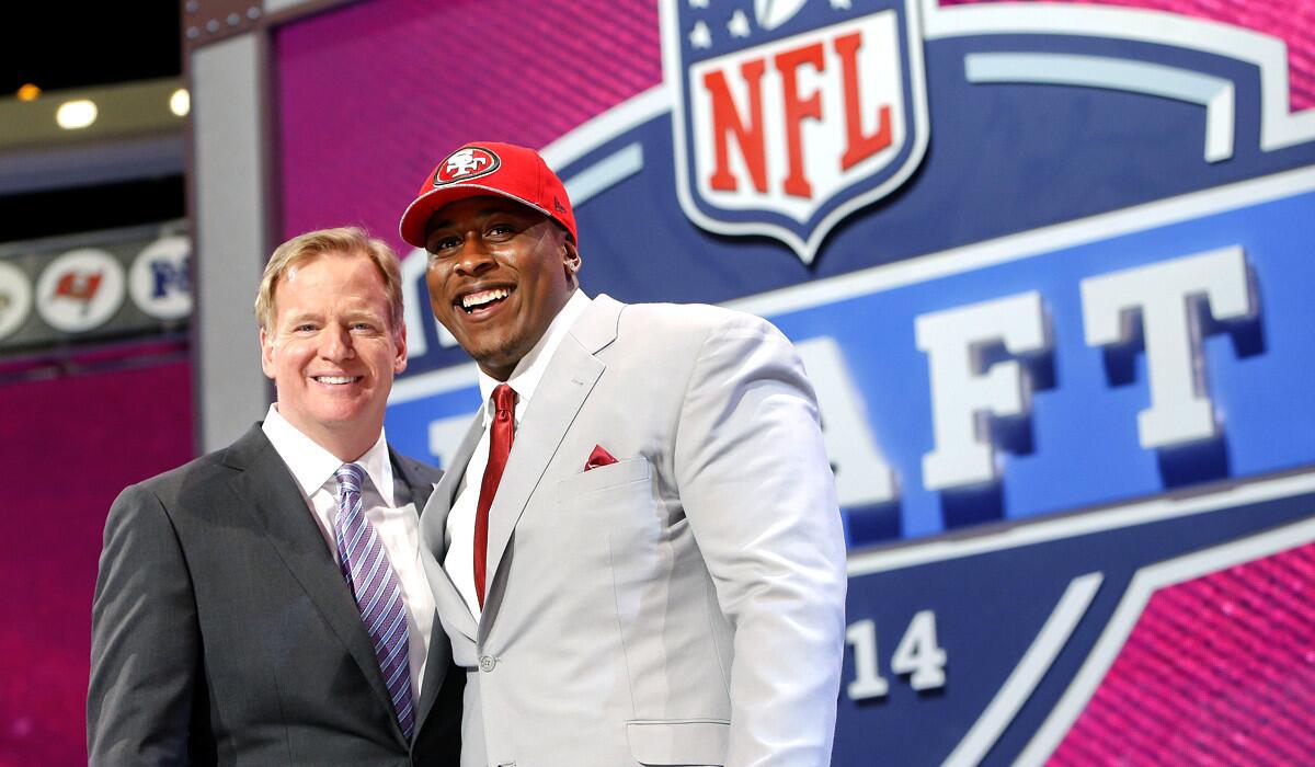 USC center Marcus Martin poses with NFL Commissioner Roger Goodell after being selected with the 70th pick of the NFL draft by the San Francisco 49ers on Friday in New York.