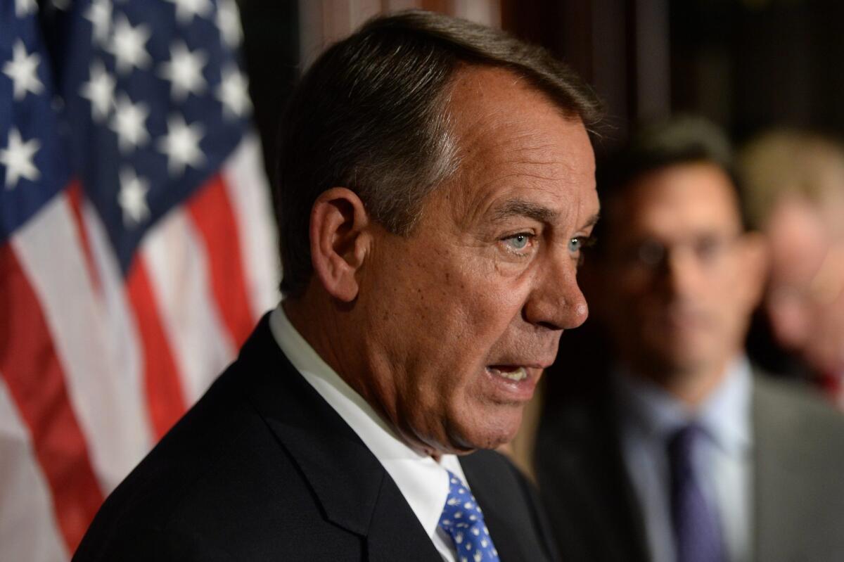 House Speaker, Republican John Boehner, holds a news conference with other House Republicans following a Republican caucus meeting on Capitol Hill in Washington.