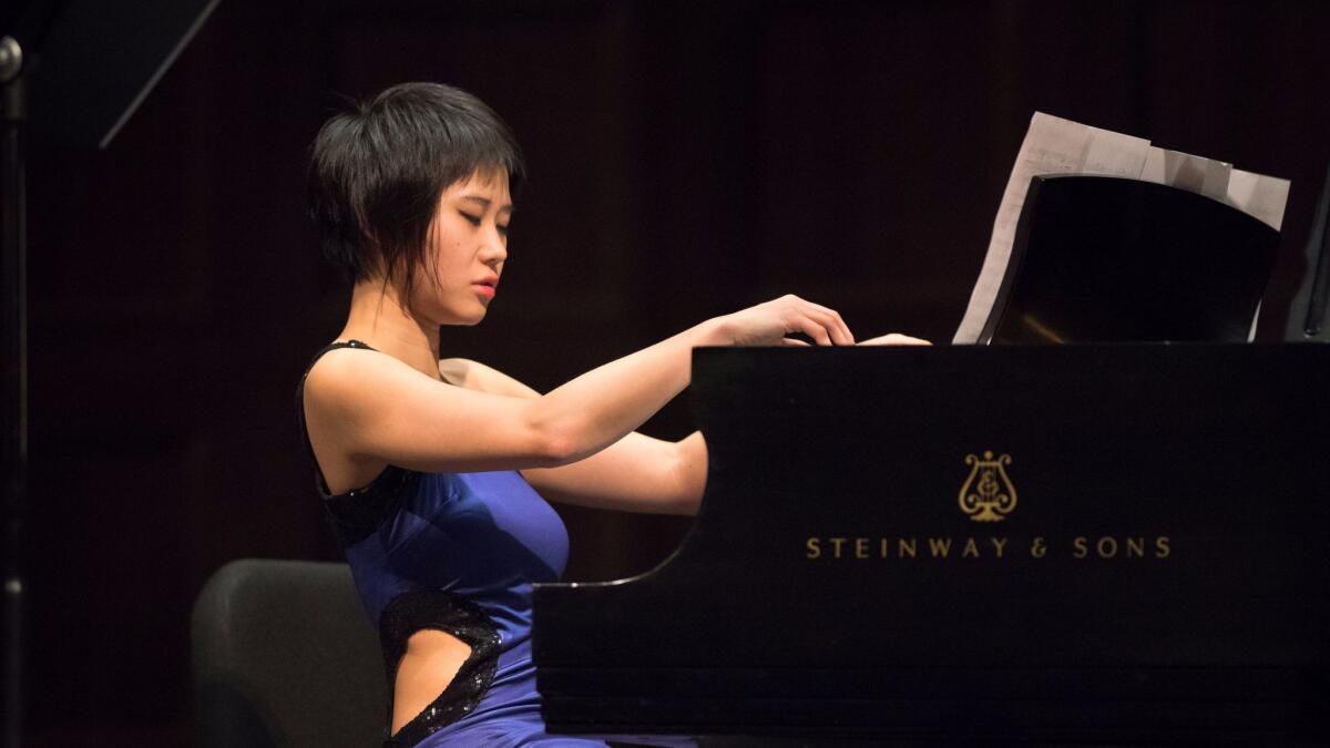 Pianist Yuja Wang performs in recital at Walt Disney Concert Hall and Segerstrom Center this week.