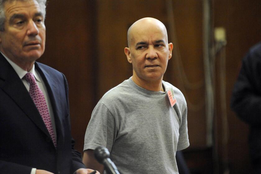 Pedro Hernandez, right, appears in Manhattan criminal court with his attorney Harvey Fishbein in 2012.