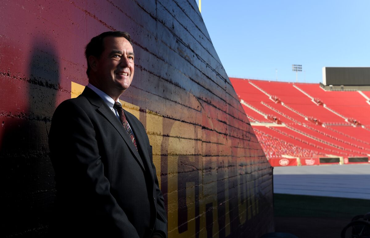 USC athletic director Mike Bohn stands in a tunnel at the Coliseum.