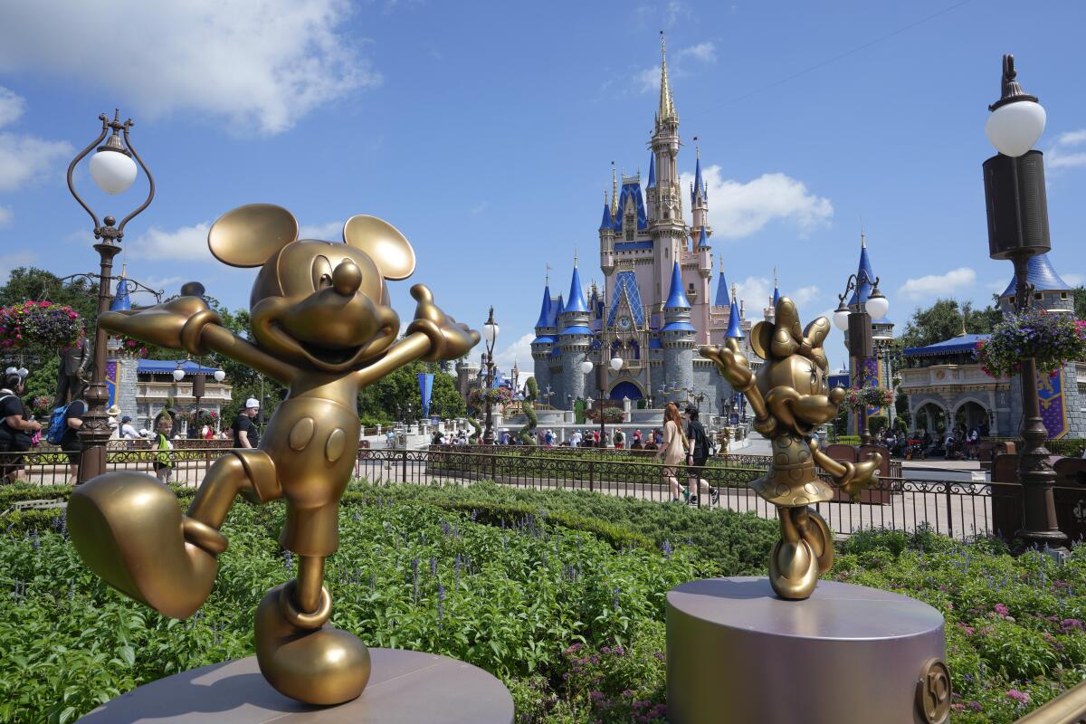 Statues of Mickey and Minnie Mouse at Walt Disney World.