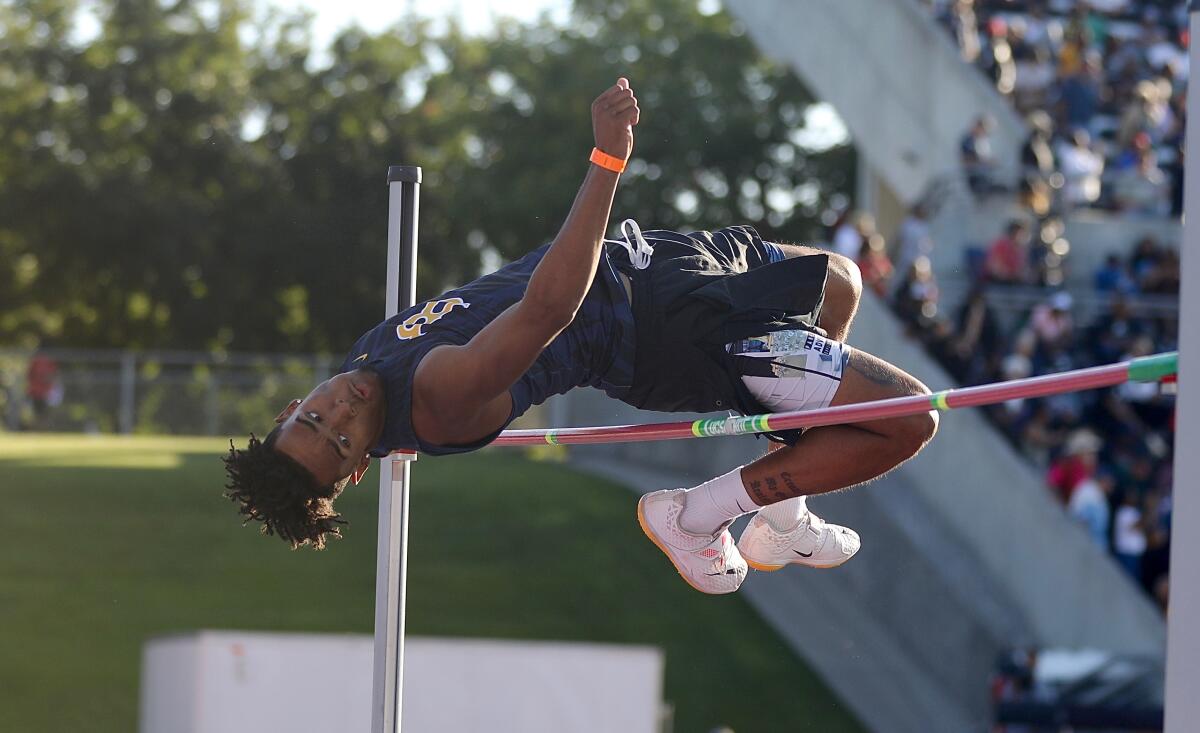 Birmingham's Deshawn Banks competes in the high jump.