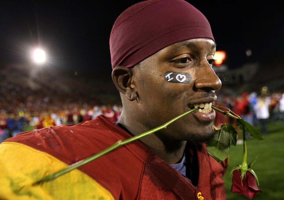 USC tight end Fred Davis celebrates with a rose after a victory over the UCLA Bruins at the Coliseum in 2007.