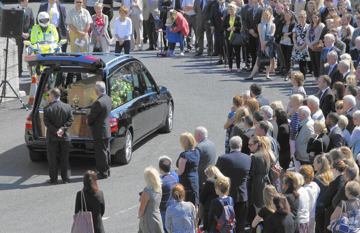 The coffin of Eimear Walsh arrives Tuesday in Dublin, Ireland. She was among the six Irish students who died after a balcony collapsed in Berkeley last week. Five bodies have been returned to Ireland, and the sixth laid to rest near Santa Rosa, Calif. Seven were injured, some with head and spinal trauma.