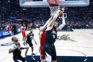 Clippers center Ivica Zubac (No. 40) gets the inside position while rebounding against Pelicans center Jonas Valanciunas.