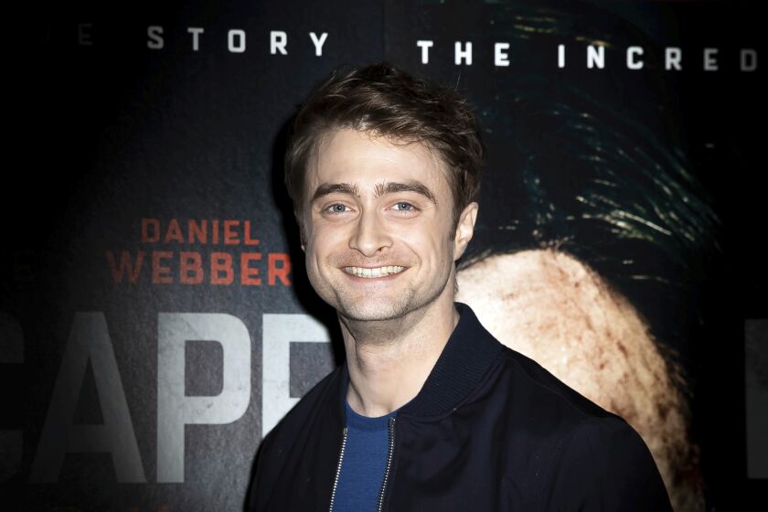 FILE - In this Sunday, Feb. 16, 2020 file photo, actor Daniel Radcliffe poses