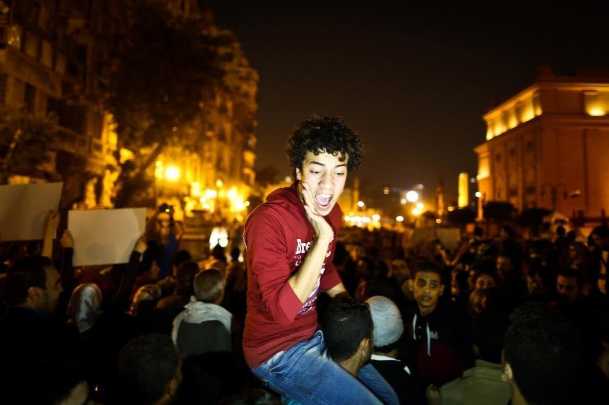 Egyptian demonstrators, some chanting slogans against corruption, protest a court's decision to drop murder charges against former President Hosni Mubarak.