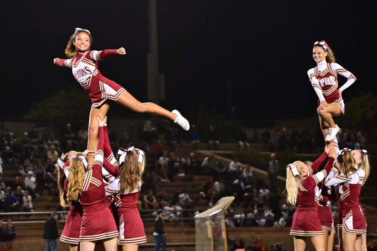 Torrey Pines cheerleaders perform at a recent football game.