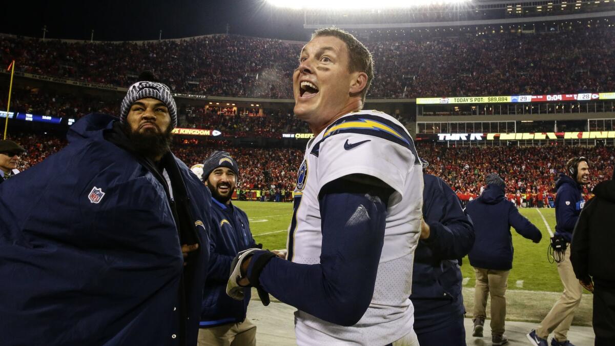 Chargers quarterback Philip Rivers taunts fans from the bench after leading the team to a 29-28 lead with four seconds left in the game against the Chiefs at Arrowhead Stadium.