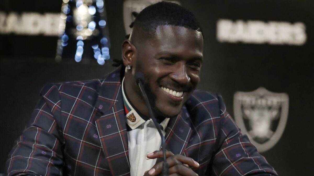 Oakland Raiders wide receiver Antonio Brown, shown at a news conference March 13, hasn't been able to practice much during training camp after reportedly misuing a cryotherapy chamber.